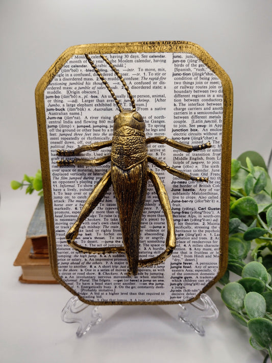 Faux Grasshopper on distressed wood  image 0