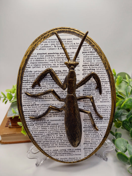 Faux Praying Mantis on distressed wood  image 0